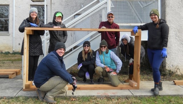 WCL Students pose with community garden planter