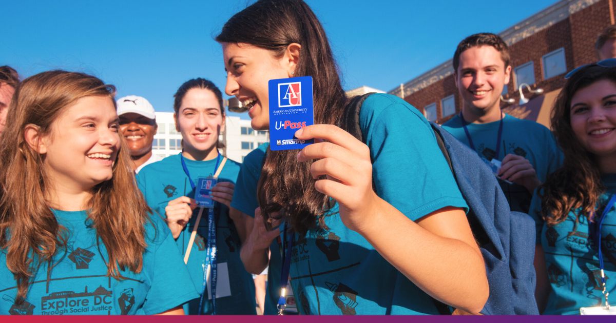 American University students showing off U-Pass card.