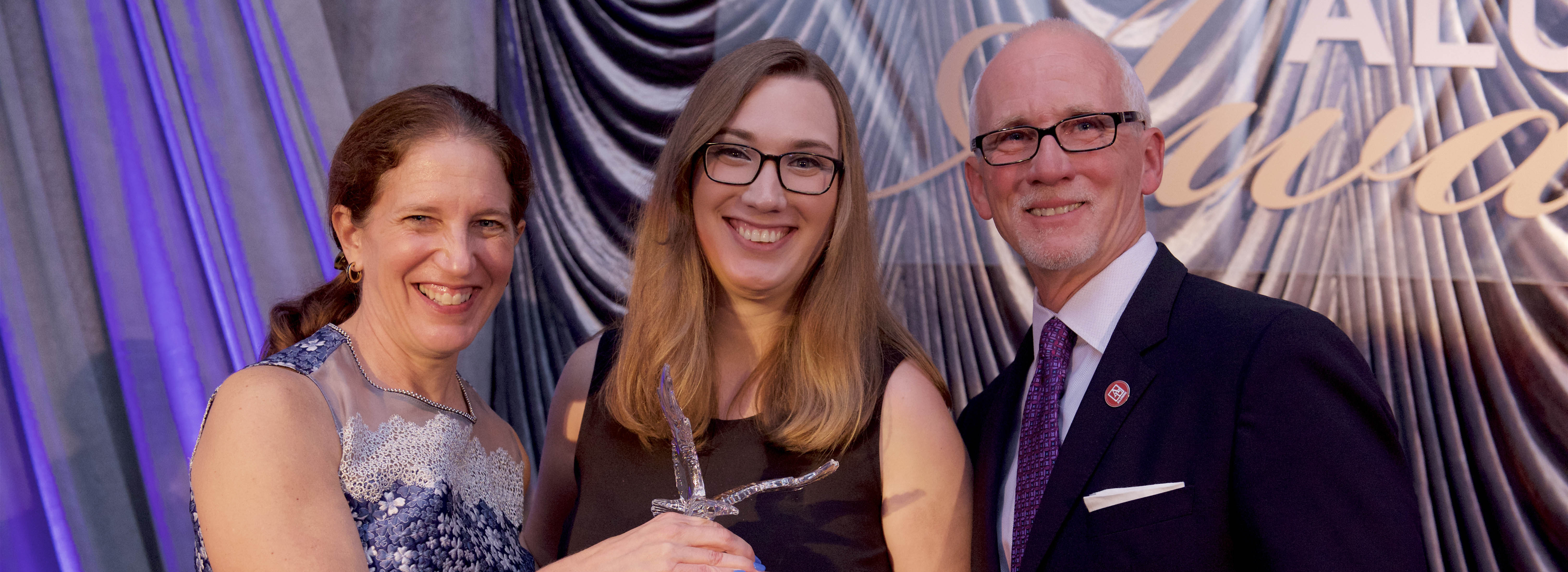 Sarah McBride receiving an award at AU