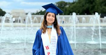 Prakriti Nepal in her graduation gown on the National Mall.