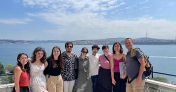 Trip group on the Topkapi Palace roof with the Bosphorus in the background
