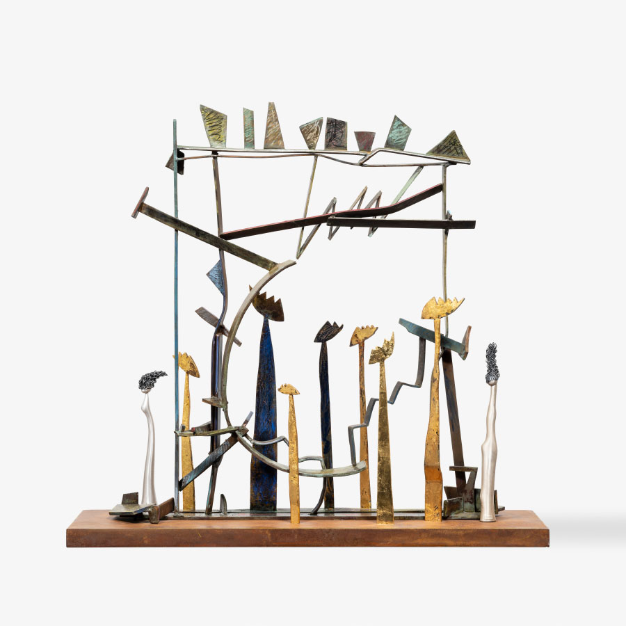 Komelia Okim, Rainbow Landscapes 11, Free standing sculpture, 2023-24. A metal sculpture with a square frame, angular shapes at the top, arcs, diagonals, and zigzags across the square, and a forest of angular shapes atop sticks.  