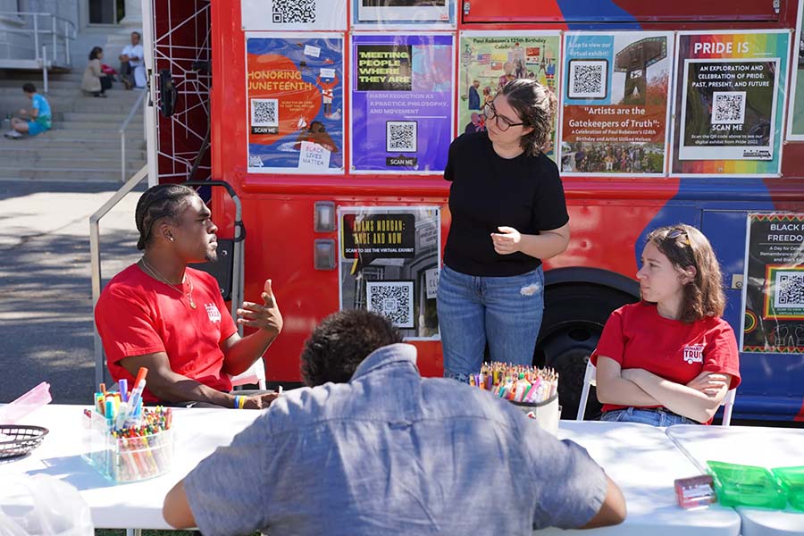 Students collaborating at the Humanities Truck