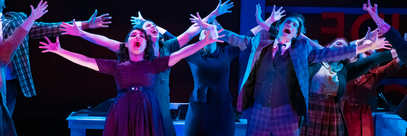 Actors with open mouths and outstretched arms