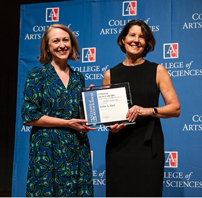 Erica Hart receives award from Linda Aldoory