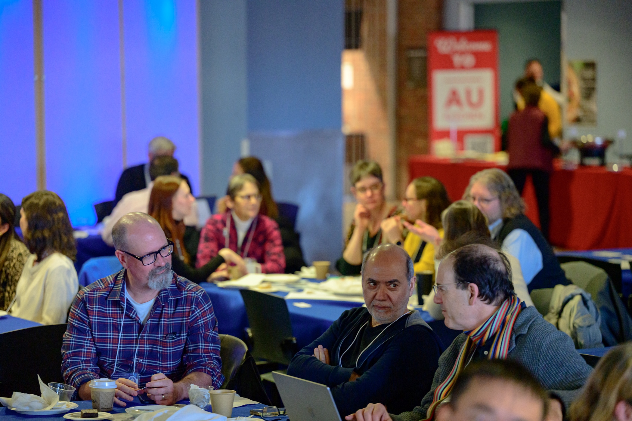 conference attendees talking