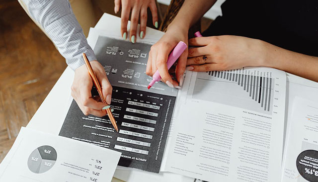 People reviewing business data