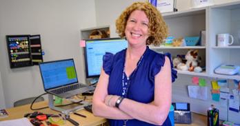 Bernadette Storey-Laubach in her Hall of Science office. Photo by Jeff Watts.