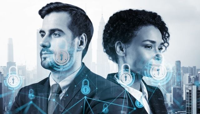 Two cybersecurity professionals with a city background
