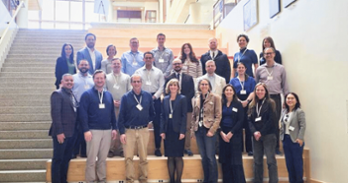 Group photo students and faculty on steps