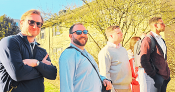 students standing outside on a tour of the campus