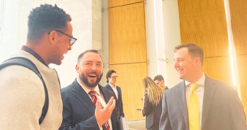 students talking and smiling