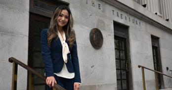 Abigail Ha, SIS/BA ’27, smiles for a photo outside the US Department of the Treasury