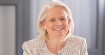 Headshot of Patricia McIlreavy smiling in formal attire.