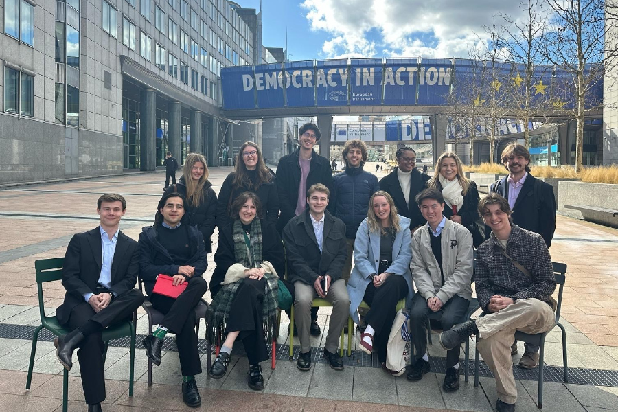 group of american university students seated in an outdoor area in brussells belgium