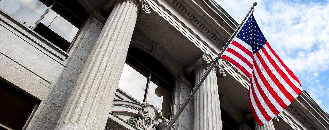 american flag on government building
