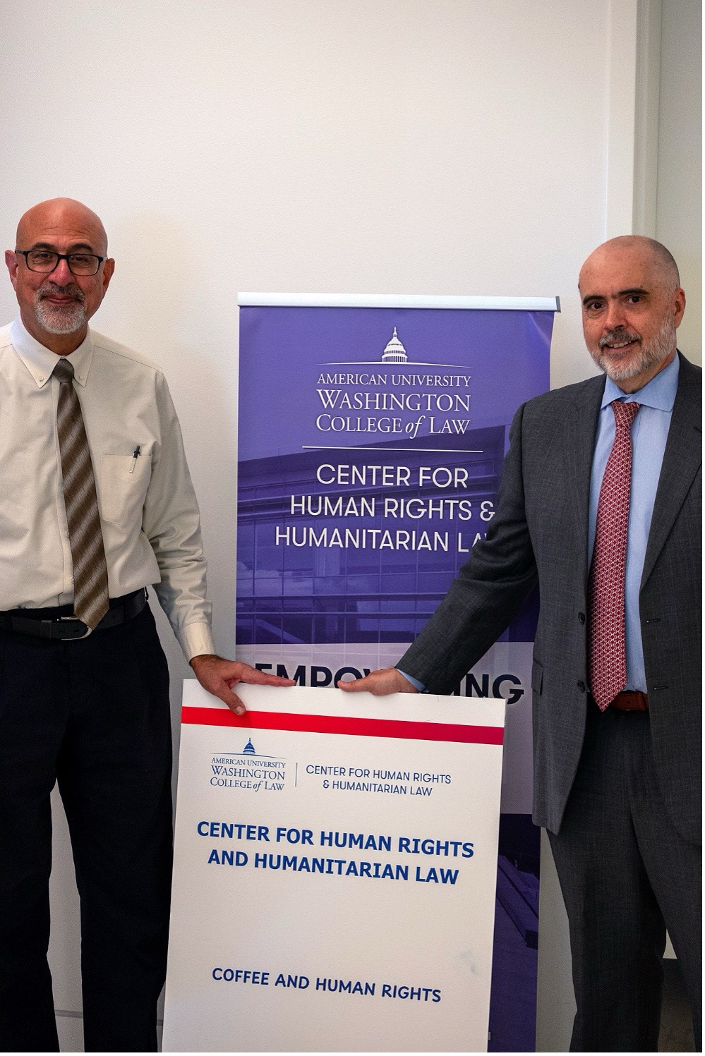 Professor Bertoni with panelist posing for photo