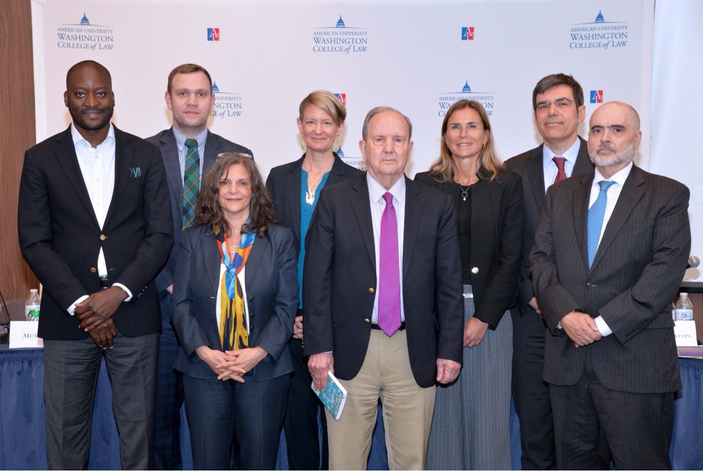 Professor Bertoni with panelists posing for photo