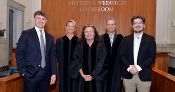 Winners Dylan Griffith (left) and James Ingersoll (right) stand with Professors Rebecca Hamilton, Elizabeth Beske, and Thomas Bondy, who served as judges.
