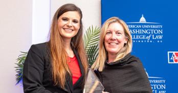 Outstanding Graduate of the Last Decade Awardee Elizabeth "Lizzie" Lewis (left) and Interim Dean Heather Hughes